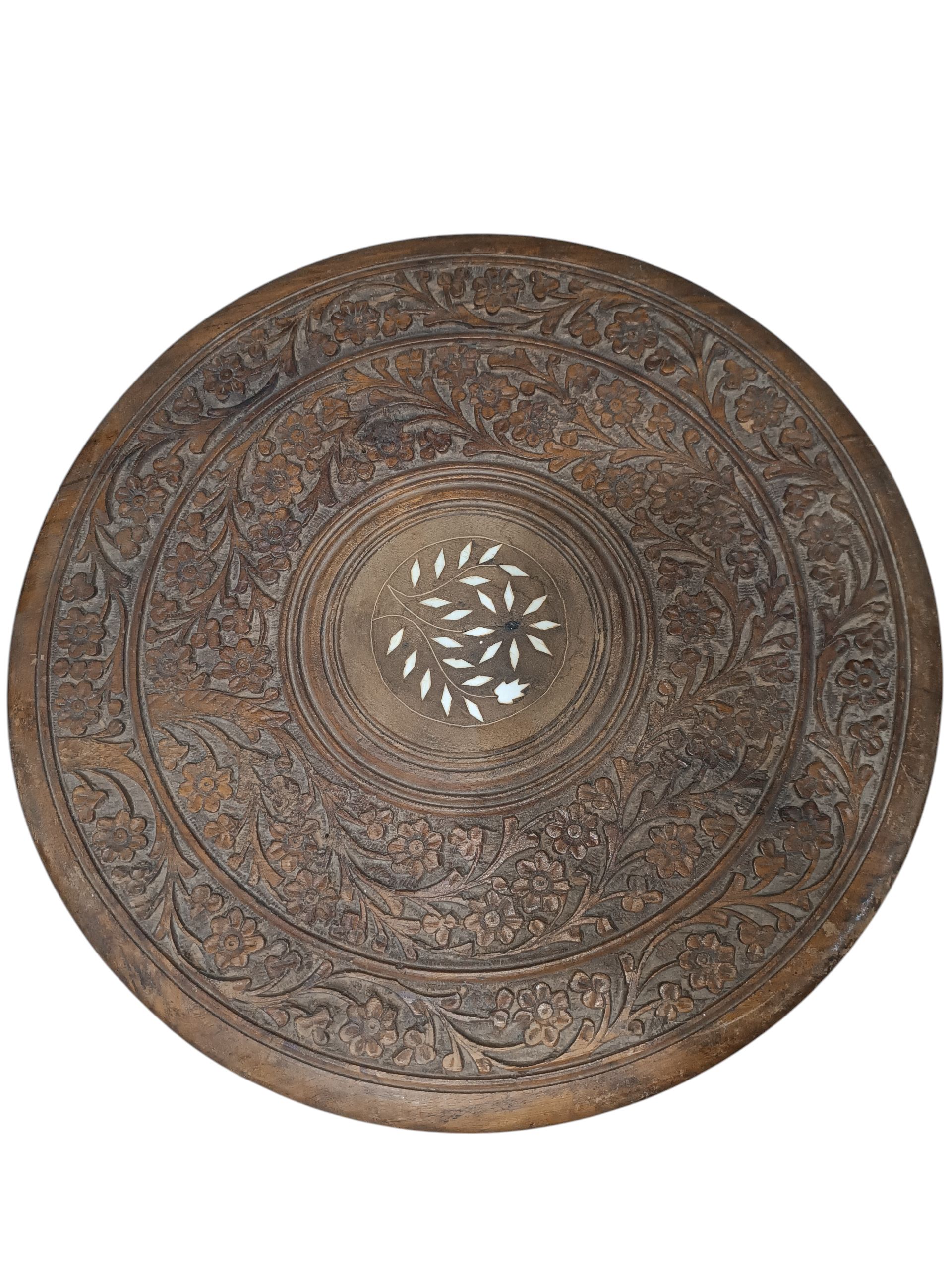 Mesa de centro de estilo oriental elaborada en madera maciza, con tablero redondo tallado a mano