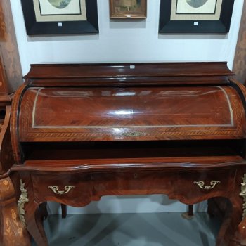 Escritorio cilíndrico con interior de cajones y palorrosa
